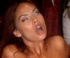 Image of a woman's face during orgasm